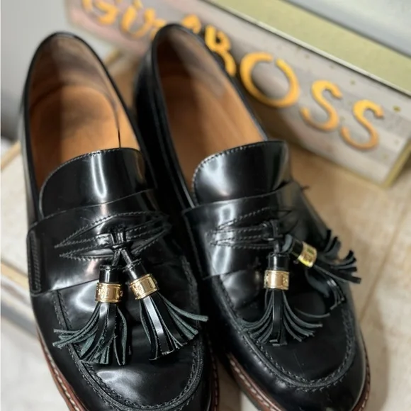 Stuart Weitzman Black Leather The Manila Tassel Slip On Loafers